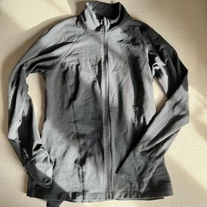 Beyond Yoga mock neck jacket with ruffle back accent. Super feminine/flattering.